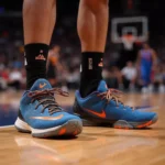 Austin Reaves wearing Nike Air Zoom Kobe 6 Protro basketball shoes