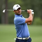 Jon Rahm swinging driver