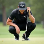 Jon Rahm wearing Callaway cap on the golf course