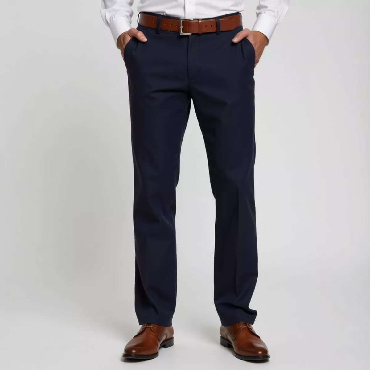 Man Wearing Navy Pants and a Brown Belt