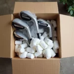 Packing Golf Clubs in Box