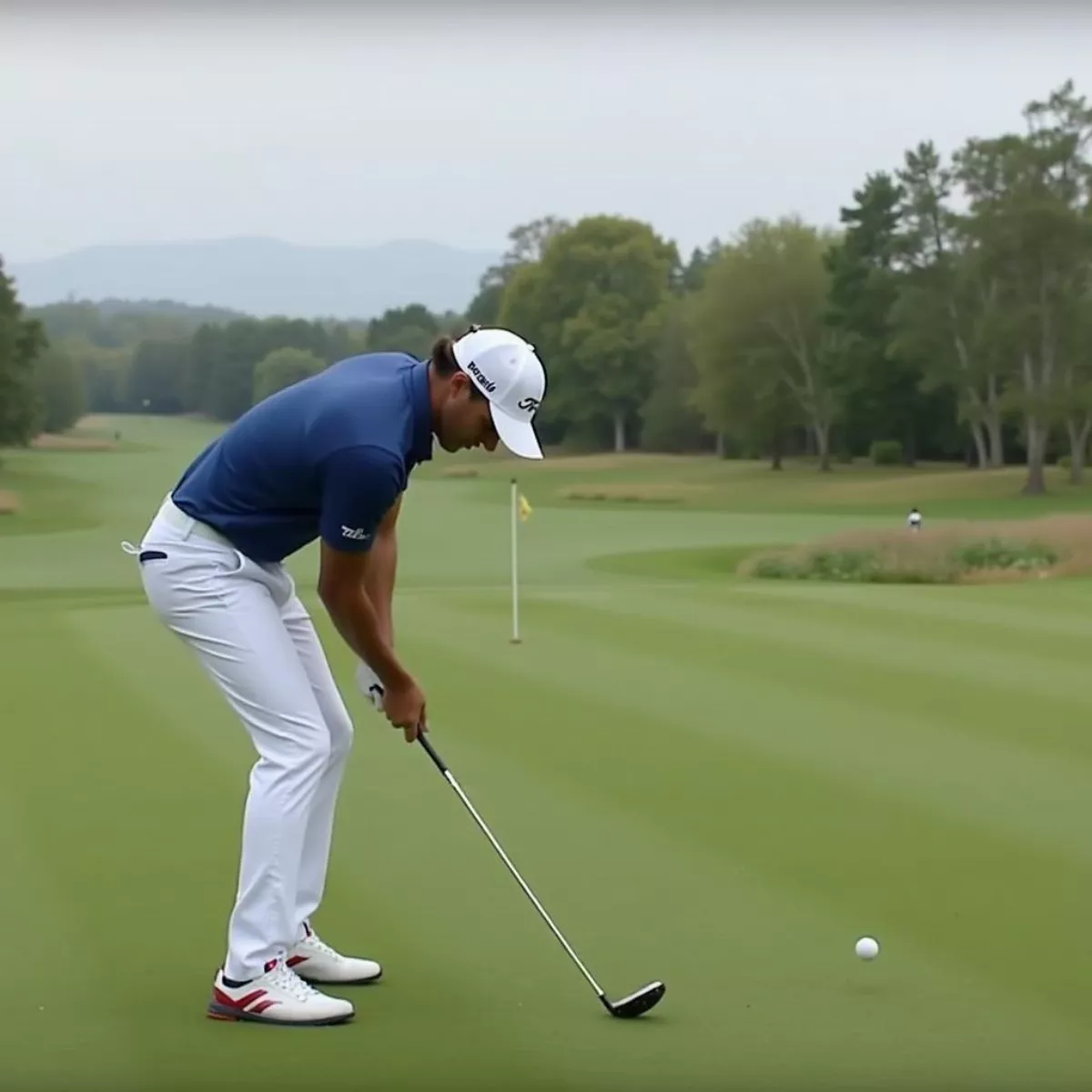 Rickie Fowler Hitting A Fairway Shot With His Titleist Tsi2